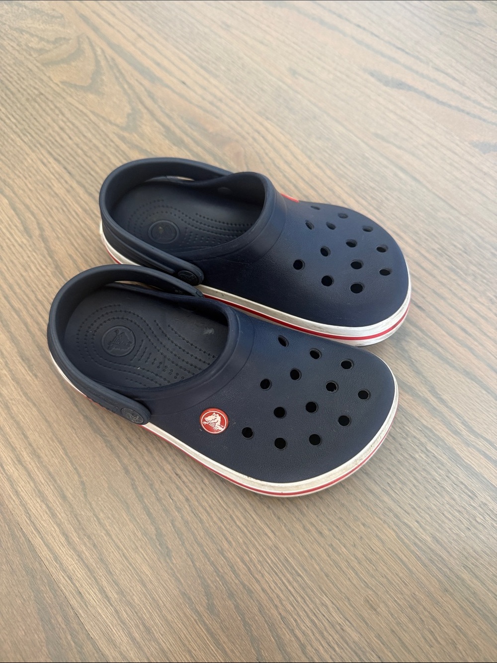 CROCS Kids Navy Clogs with Red and White Trim